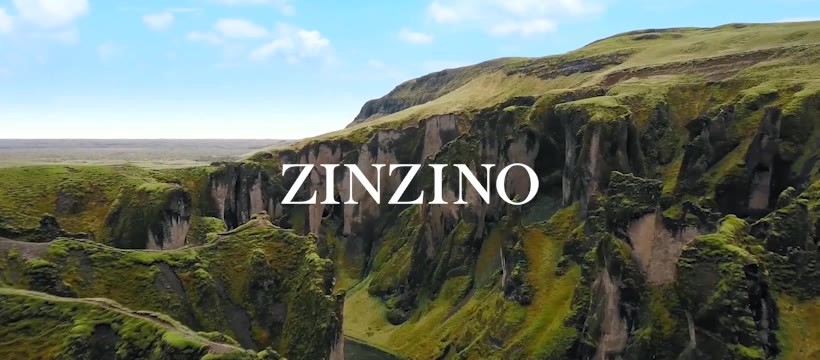 green mountains with the zinzino name placed across the front of them